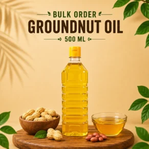 Bulk Order Groundnut Oil 500ml bottle displayed with groundnuts and natural theme